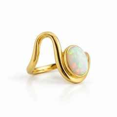 1.5 ct oval cabochon opal silver, gold ring