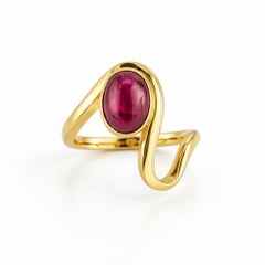 1.5 ct oval cabochon ruby silver, gold ring