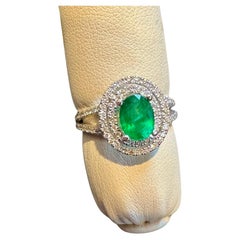 1.5 Ct Oval Cut Natural Emerald & 2 Ct Natural Diamond Halo Engagement Ring
