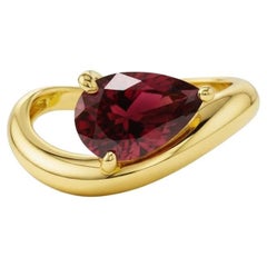 1.5 ct pear garnet silver, gold ring