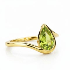 1.5 ct pear peridot 14k gold ring