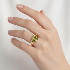 1.5 ct pear peridot silver, gold ring
