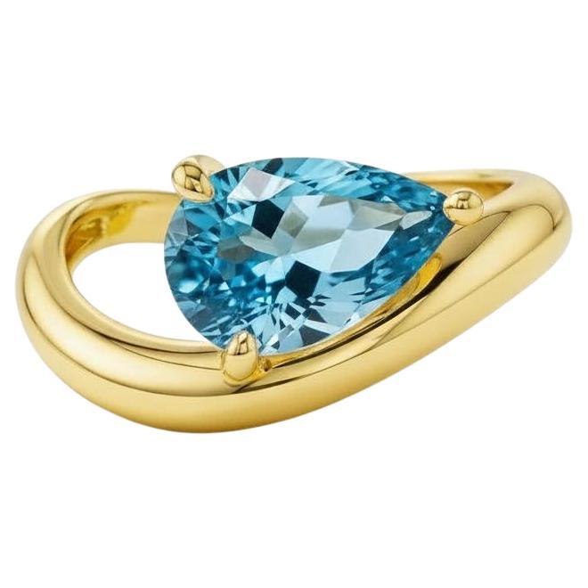 En venta: anillo de plata y oro con topacio pera de 1,5 ct