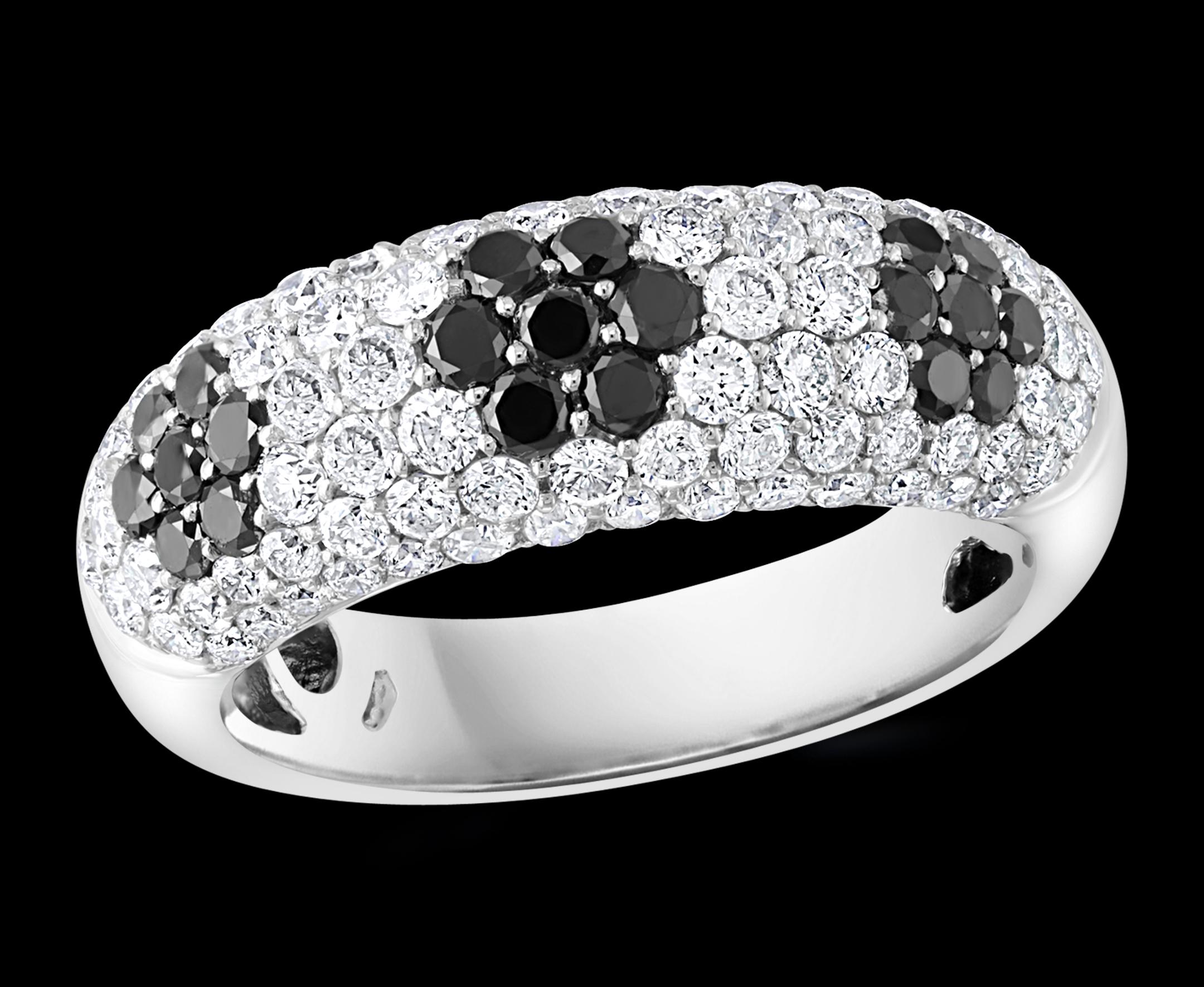 1.5 Ct White Diamond And 0.6 Ct Black Diamond Cocktail Ring 14 Karat White  Gold
21 Black Diamonds approximately 0.20 Ct 
Diamond Eye Clean   quality and has lots of bling
This is a very affordable ring  from our affordable wedding collection.
These