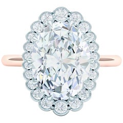 1.5 GIA Certified Oval Diamond Set in Platinum and Rose Gold Engagement Ring