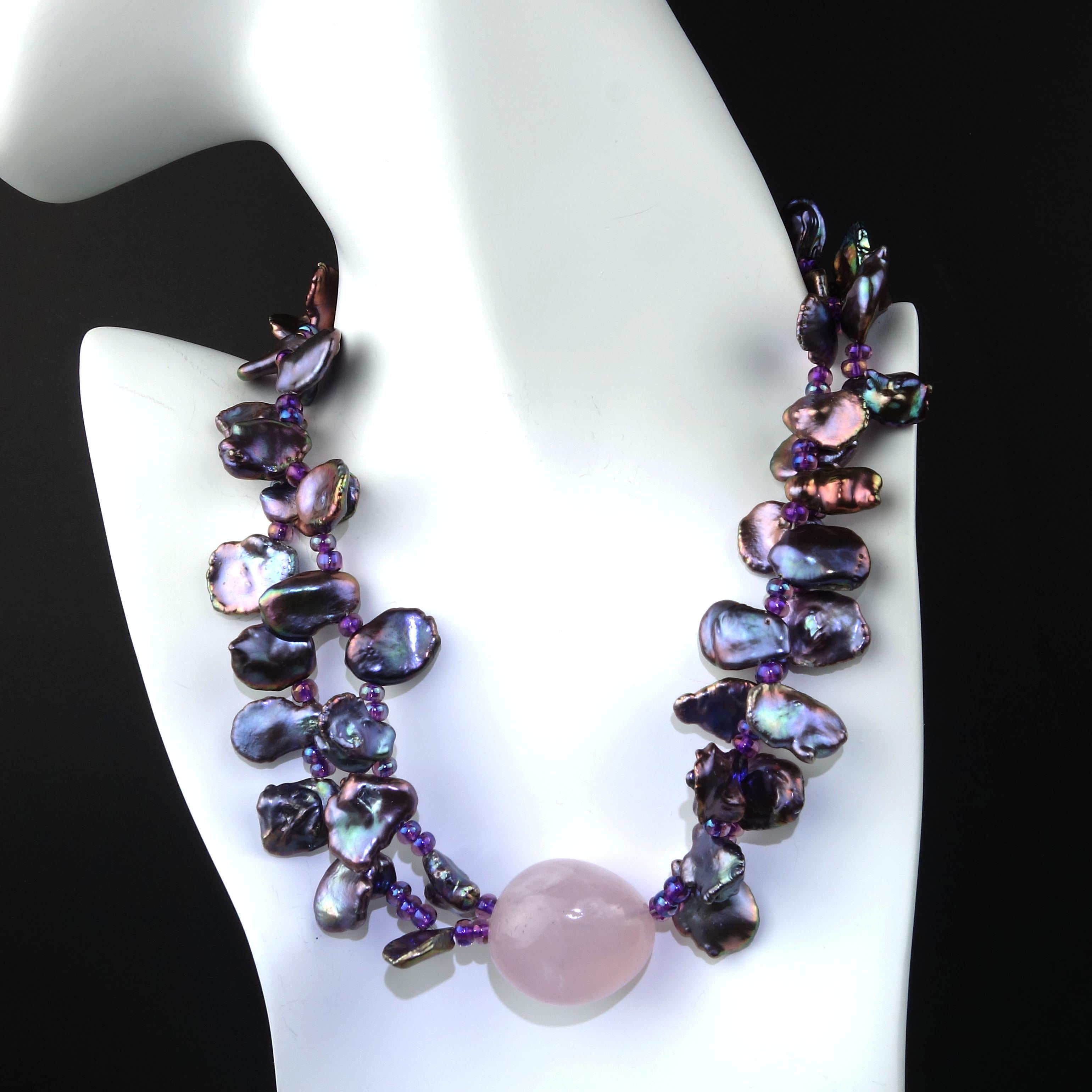 One of a kind, handmade, 15 inch Choker Style Necklace that is a perfect addition to your wardrobe. This 15 inch choker has two strands of lovely Peacock Iridescent Keshi Pearls (15x15mm) and a highly polished translucent Rose Quartz Nugget Focal