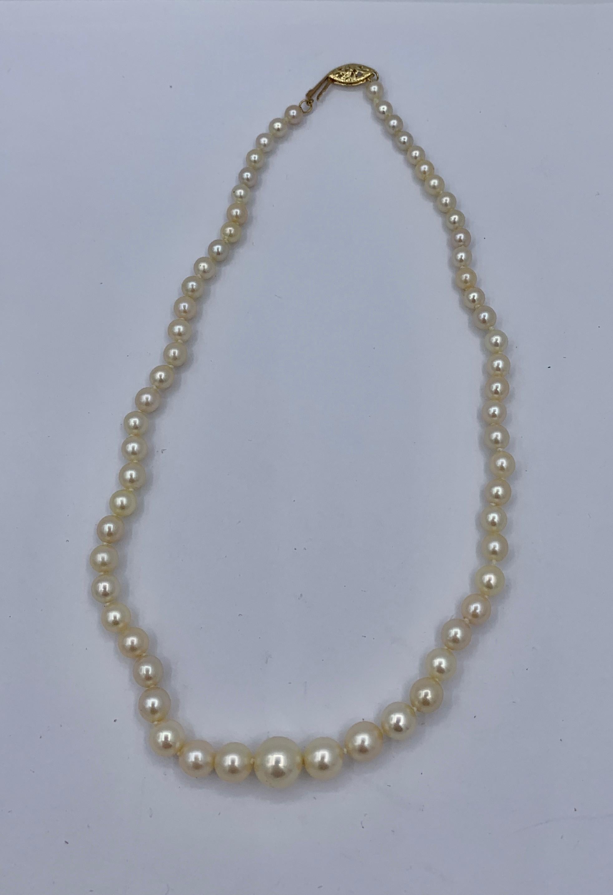 Round Cut Graduated Pearl Necklace 14 Karat Gold Clasp Hollywood Regency