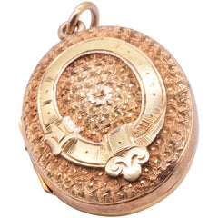 15 Karat Chased "Belt & Buckle" Motif Antique Locket, circa 1880