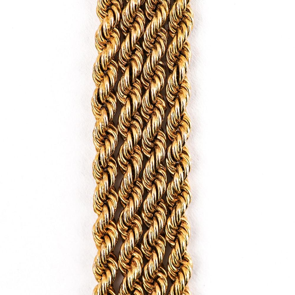 A superb antique Victorian 15 karat yellow gold long guard chain or muff chain. It is 153cm/60” long with a swivel fastener at the end to hold a locket or pocket watch if required. This antique chain is a rope pattern and weighs 49g of 15k gold. For