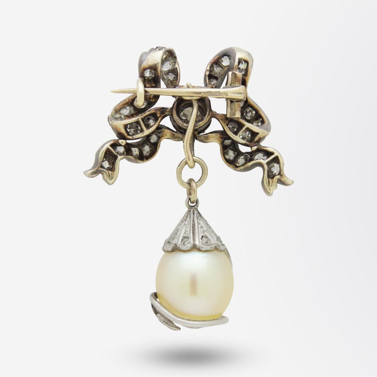 Edwardian 15 Karat Yellow Gold, Silver, Natural Pearl, and Diamond Brooch Pendant For Sale