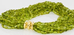 15 Strand Torsade Peridot Beads with 18 Karat Yellow Gold Clasp