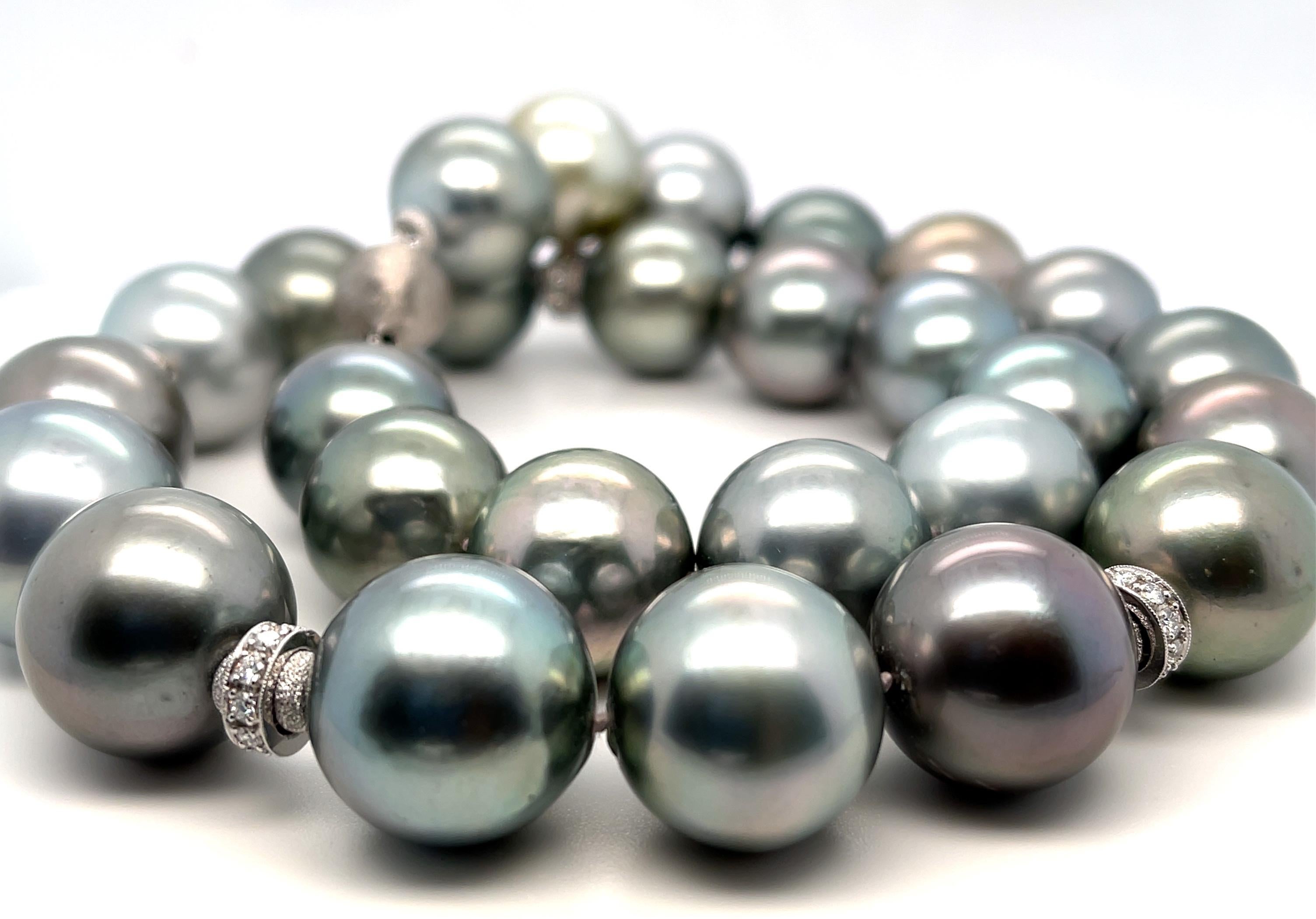 This stunning strand of silver-gray South Seas pearls features 27 impressive round pearls graduating in size from 15.36mm to a spectacular 17.45mm pearl in the center the necklace! The pearls are of excellent quality, with gorgeous pearlescence and