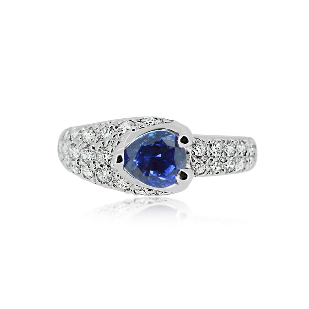 Pear Shape Sapphire  AAA brilliant deep Blue color 1.50 carat.
Total diamonds 0.70 carat G H-VS
14k White Gold 3.00Grams, 
Finger Size 7
All stones are natural and none treated.