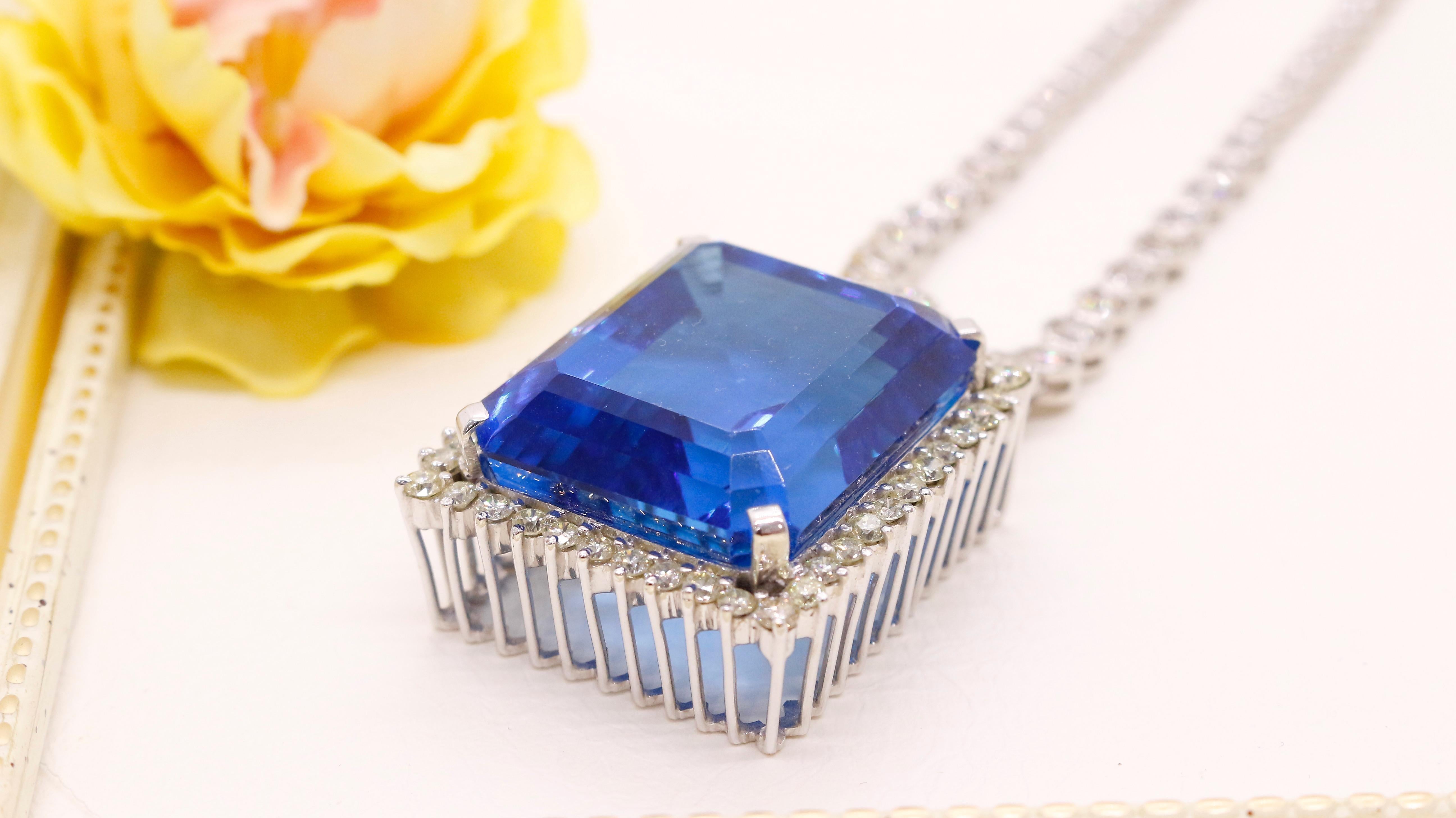 Women's 150 Carat Blue Topaz Pendant with Diamonds For Sale