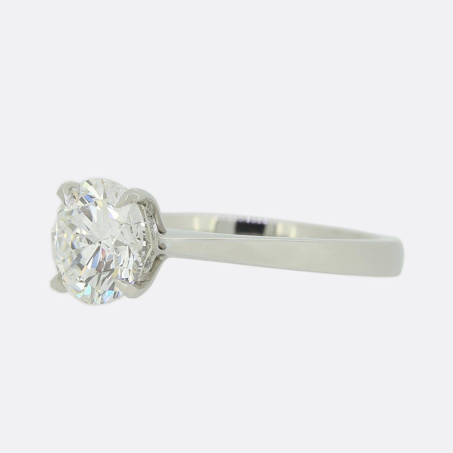 This is a stunning platinum diamond engagement ring. The focal point of this ring is a certified 1.50 carat round brilliant cut diamond set in a four claw diamond set collet with a platinum ring shank.

Condition: Used (Excellent)
Weight: 4.6