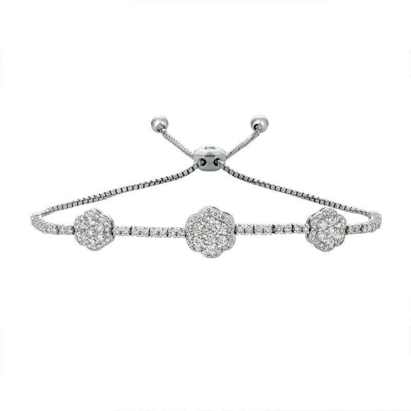 1.50 Carat Natural Diamond Bolo 5 Flower Bracelet G SI 14K White Gold 7''

100% Natural Diamonds, Not Enhanced in any way Round Cut Diamond Bracelet 
1.50CT
G-H 
SI  
14K White Gold, Pave Style   5.2 gram
7-8 inches adjustable length, 5/16 inch in