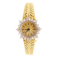 1.montre Geneve à quartz pour femmes:: or jaune 14 carats:: lunette avec diamants 50 carats