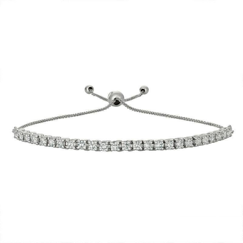 1.50 Carat Natural Diamond Bolo Tennis Bracelet G SI 14K White Gold 7''

100% Natural Diamonds, Not Enhanced in any way Round Cut Diamond Bracelet 
1.50CT
G-H 
SI  
14K White Gold, Pave Style,   5.3 gram
7-8 inches adjustable length, 1/8 inch in