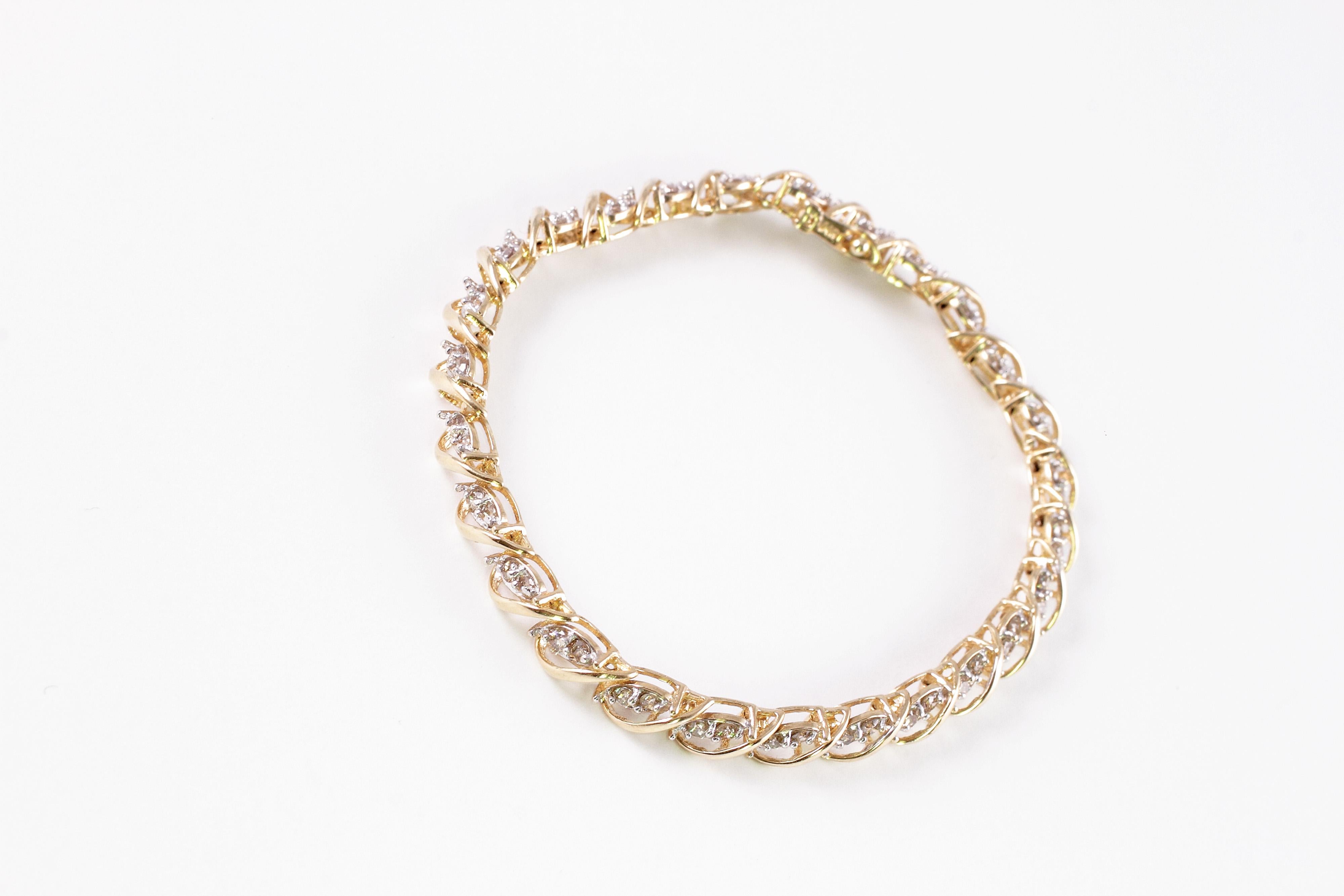 Classic 1.50 carat total weight diamond bracelet in 14 karat yellow gold.  This bracelet is perfect for every day wear or a night on the town!  A diamond bracelet is always in style!