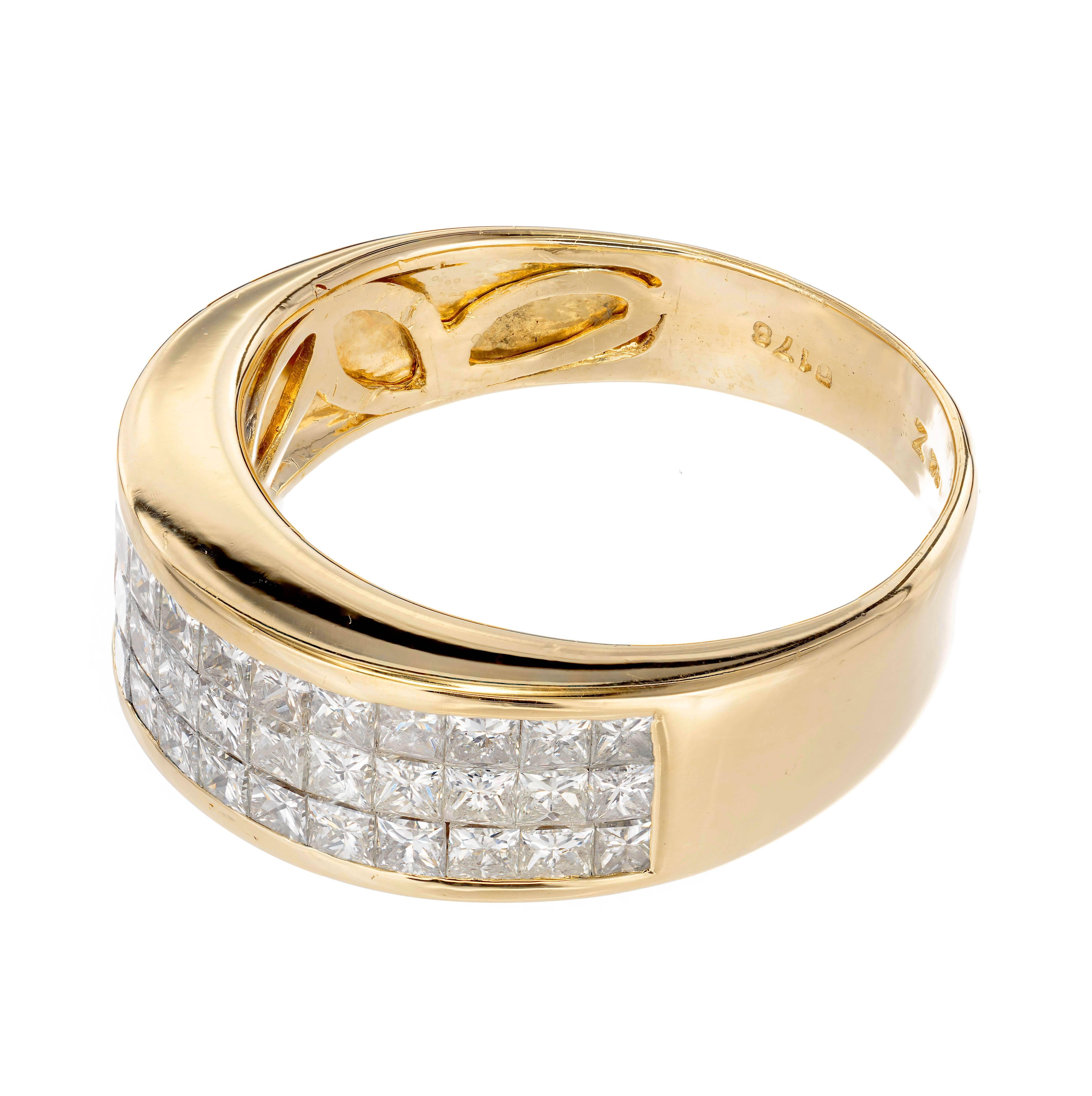 Invisible set three row princess cut diamond 1.50ct domed band ring in 18k yellow gold.

42 princess cut diamonds G-H VS approximate 1.50 carats
Size 8 ½ and sizable
18k Yellow Gold
Stamped: 18k
Hallmark: Z 0178
7.0 Grams
7.44mm wide at top
4.11mm