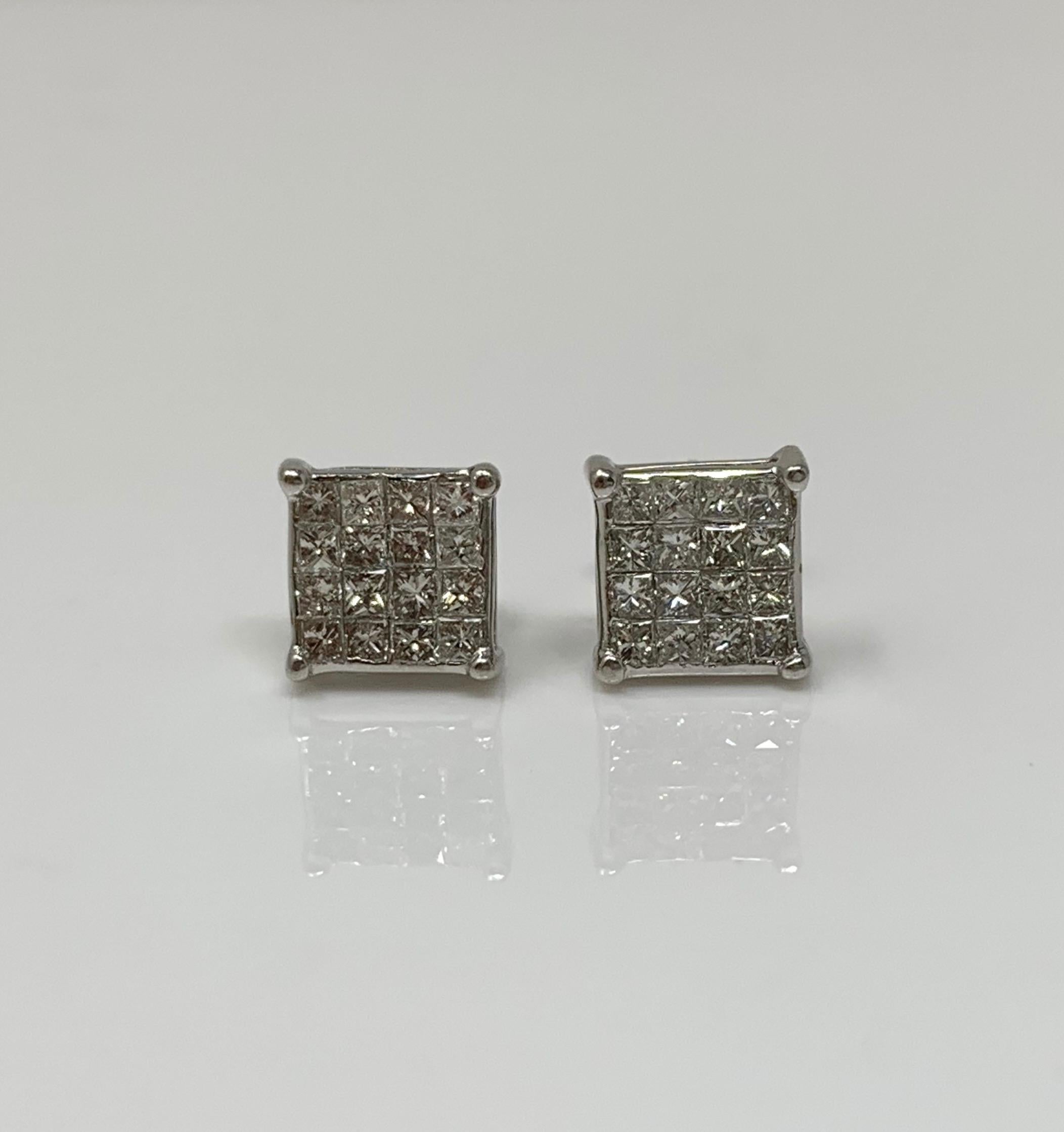 Moguldiam Inc's invisible set Diamond stud earrings are hand made in 14k white gold. 

Diamond weight : 1.50 carat 
Metal : 14k white gold 

