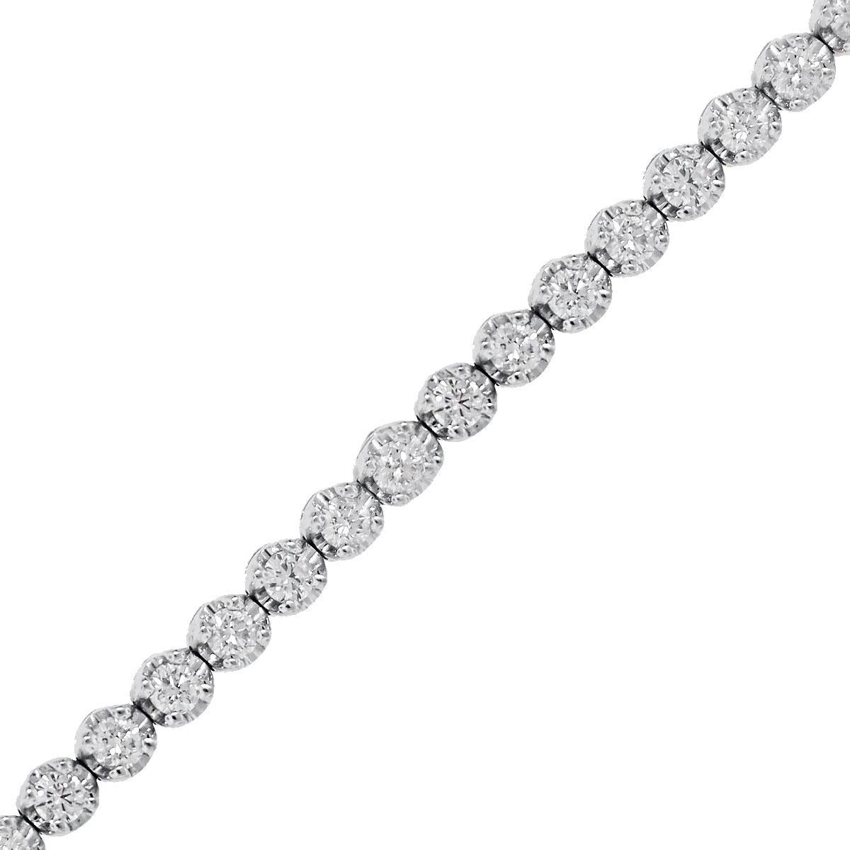 Material: 18k White Gold
Diamond Details: Approximately 1.50ctw round brilliant diamonds. Diamonds are H/I in color and SI1 - SI2 in clarity.
Clasps: Tongue in box with safety latch
Total Weight: 6.9g (4.4dwt)
Length: 6.5