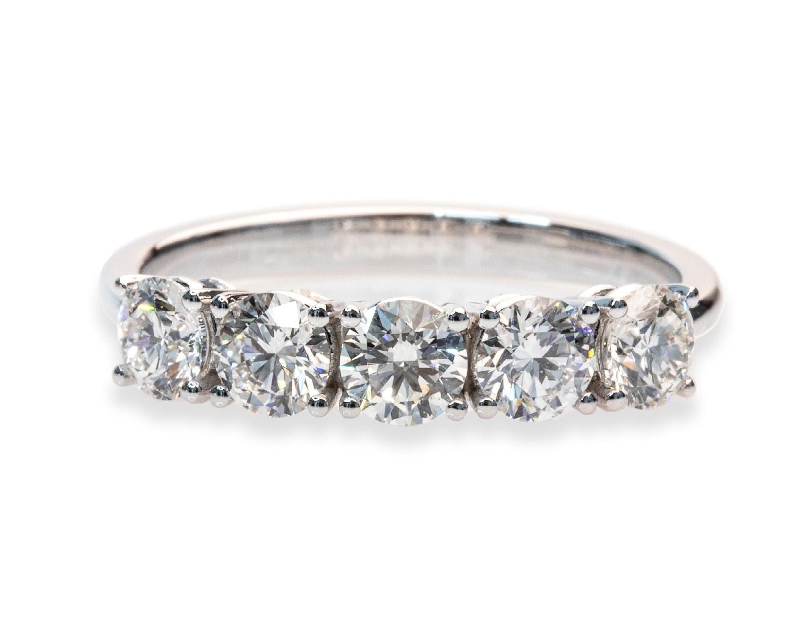 Presenting the exquisite 1.50 Carat in total, E-F per color VS per Clarity 18K White Gold 5 Diamonds Round Brilliant Cut Half Band Ring, a refined and versatile piece crafted to captivate.

This stunning band ring features five brilliant round