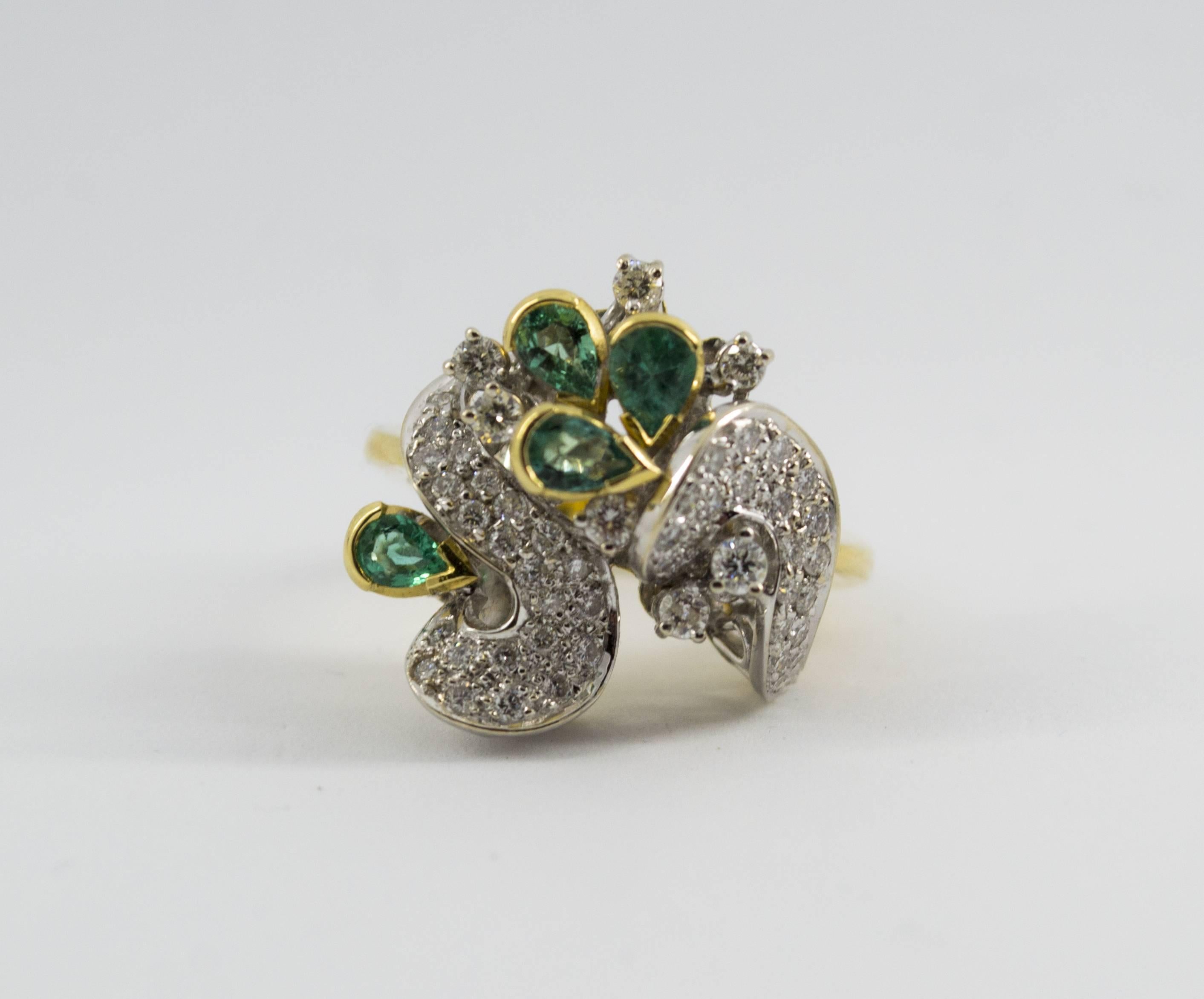 This Ring is made of 18K Yellow Gold.
This Ring has 1.00 Carats of Diamonds.
This Ring has 1.50 Carats of Emeralds.
Size ITA: 18 Size USA: 8 1/4
We're a workshop so every piece is handmade, customizable and resizable.