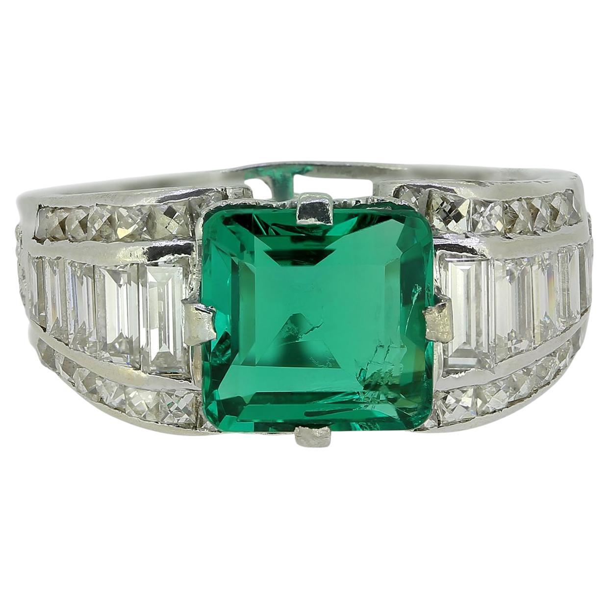 1.50 Carat Emerald and Diamond Ring