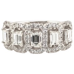 1.50 Carat Emerald Cut and Round Diamond Ring