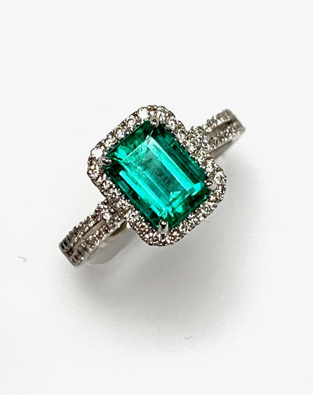 Modern 1.50 Carat Emerald Diamond Cocktail Ring For Sale