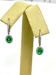 1.50 Carat Emerald Diamond Dangle Earrings