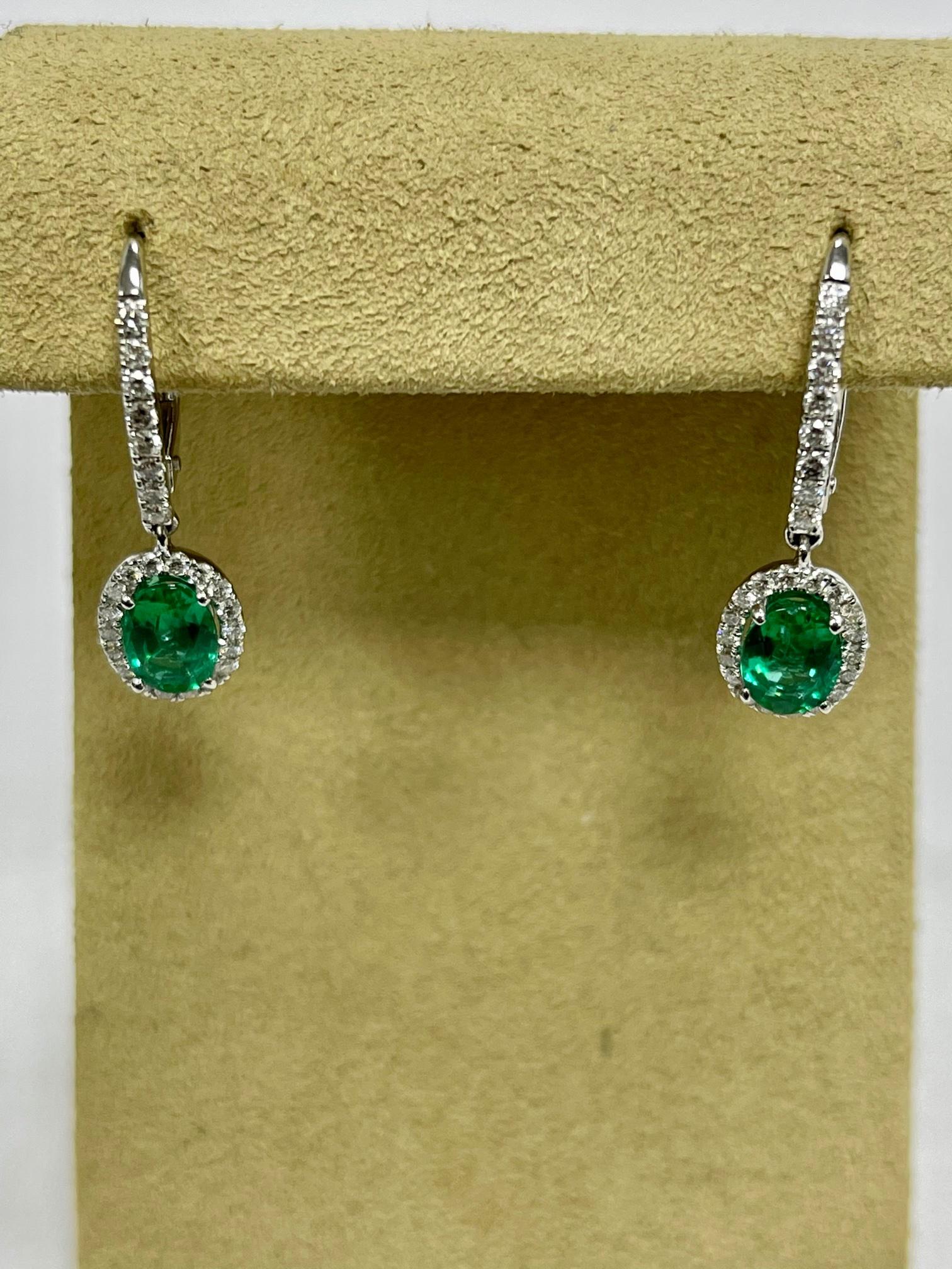 Modern 1.50 Carat Emerald Diamond Dangle Earrings