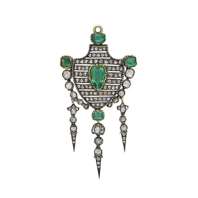 Simply Beautiful! Elegant and finely detailed Antique Victorian Emerald and Diamond Silver on Gold Vintage Pendant Necklace. Securely Hand set with a GIA 1.50 Carat Columbian Minor Emerald, 1.50tcw Diamonds and 1.40tcw Emeralds. Artistically