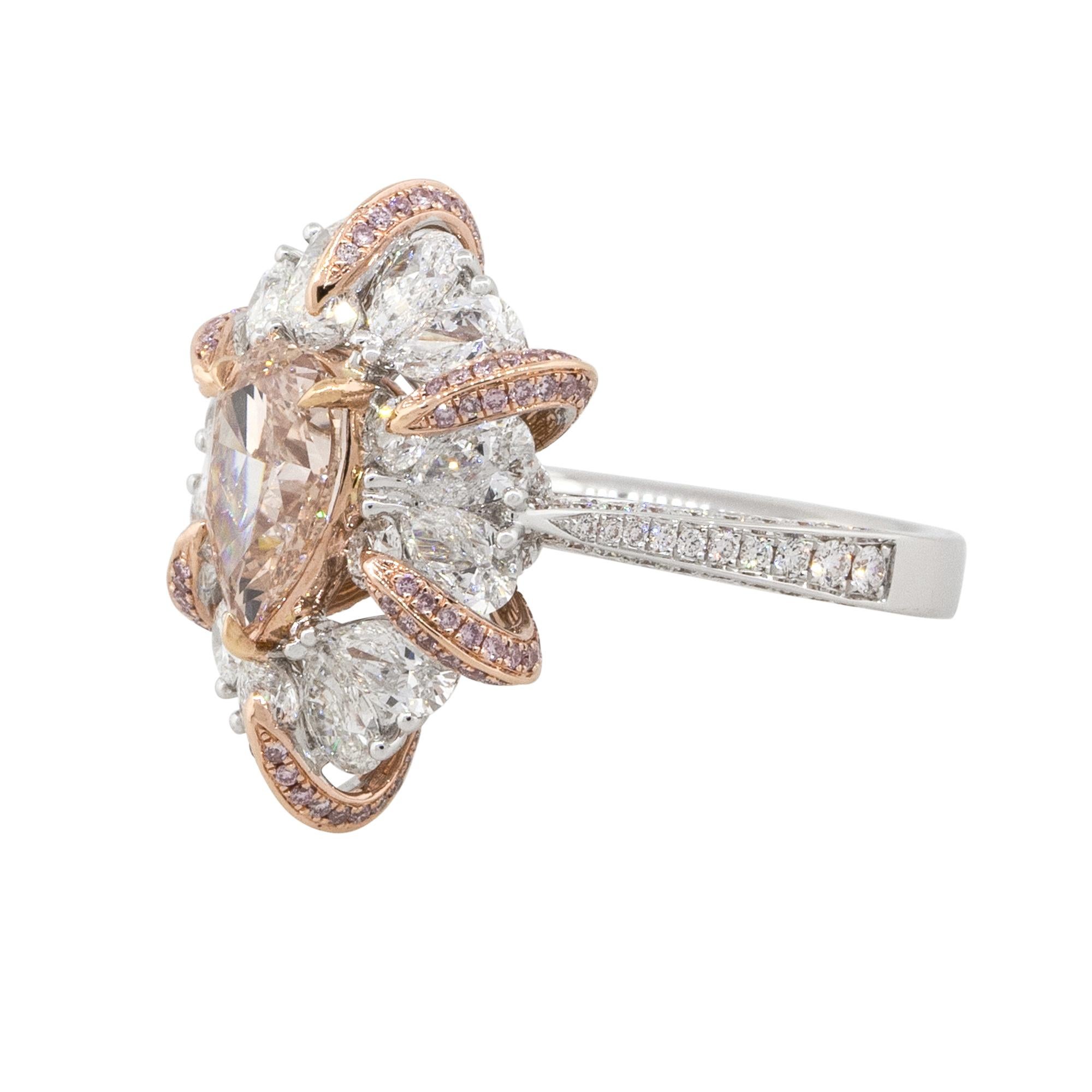 Material: 18k white gold & 18k rose gold
Center Diamond Details: 1.50ct pear shape Diamond. Diamond is Fancy Orange-Brown in color and VVS1 in clarity. GIA: 5273296645
Diamond details: Approx. 0.80ctw of round cut Diamonds. Diamonds are G/H in color