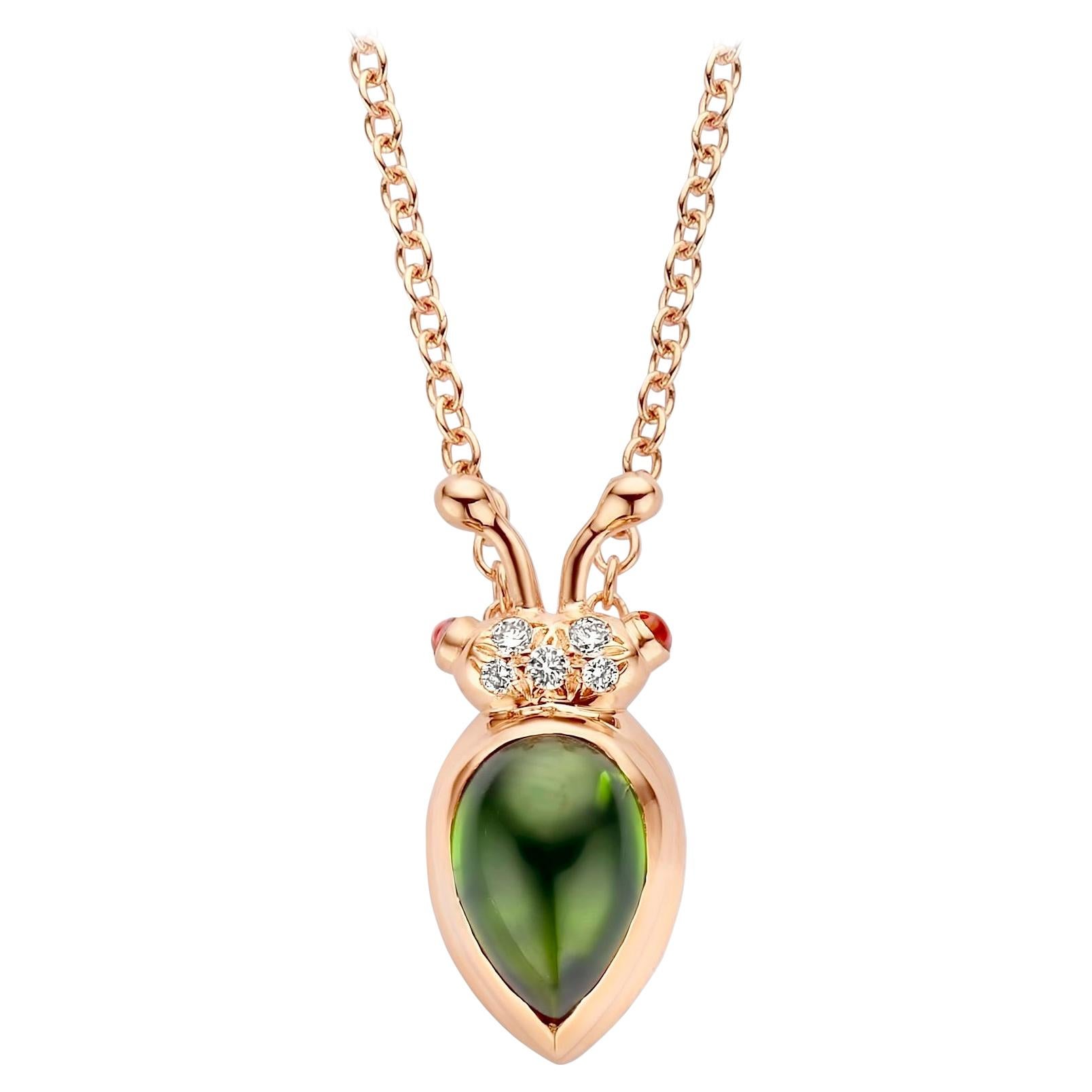 One of a kind lucky beetle necklace in 18K rose gold 6g created by jewelry designer Celine Roelens. This necklace is set with the finest diamonds in brilliant cut 0,04Ct (VVS/DEF quality) and one natural, green tourmaline in pear cabouchon cut