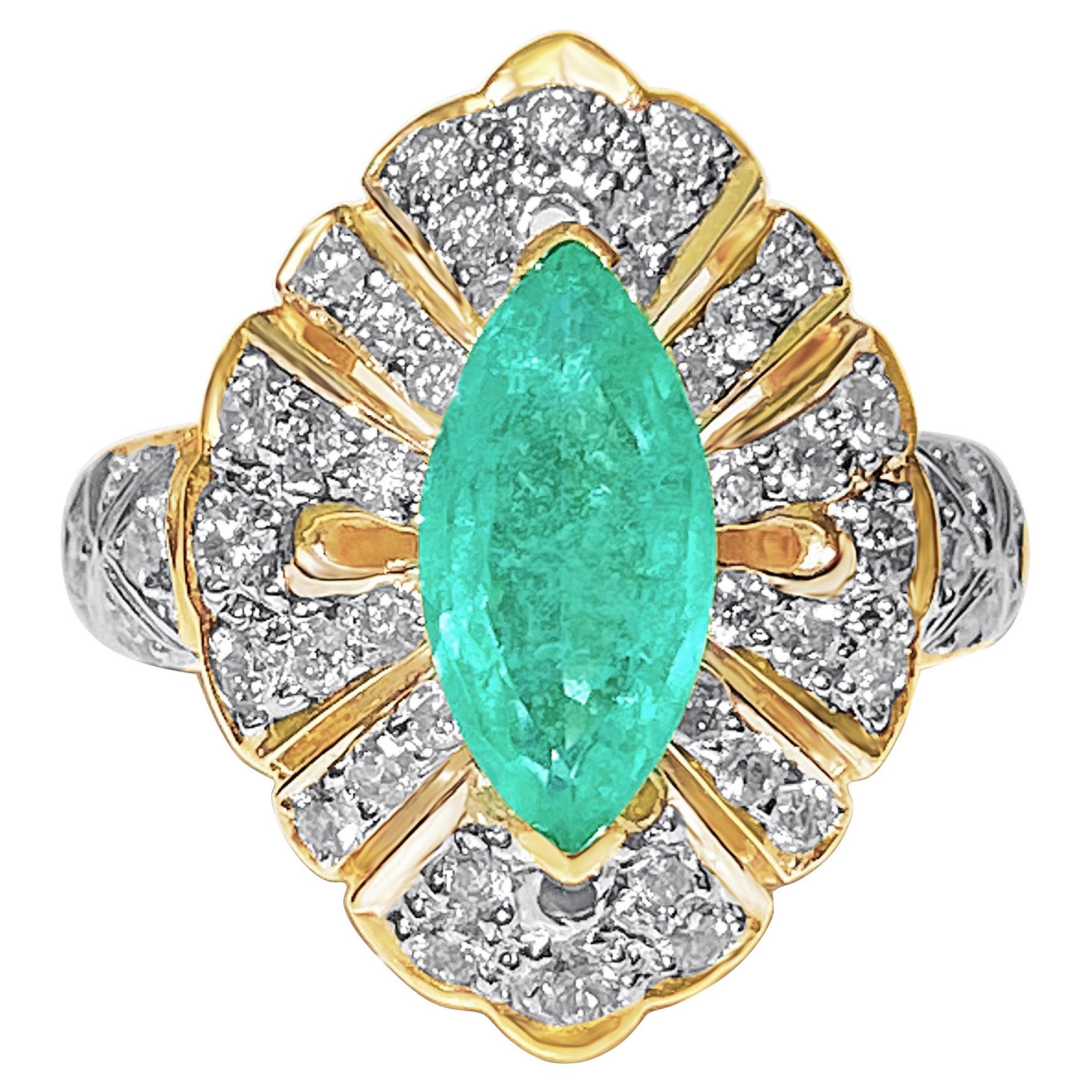 1.50 Carat Marquis Cut Colombian Emerald, Diamond and 14 Karat Yellow Gold Ring For Sale
