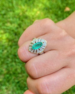 1.50 Carat Marquis Cut Colombian Emerald, Diamond and 14 Karat Yellow Gold Ring