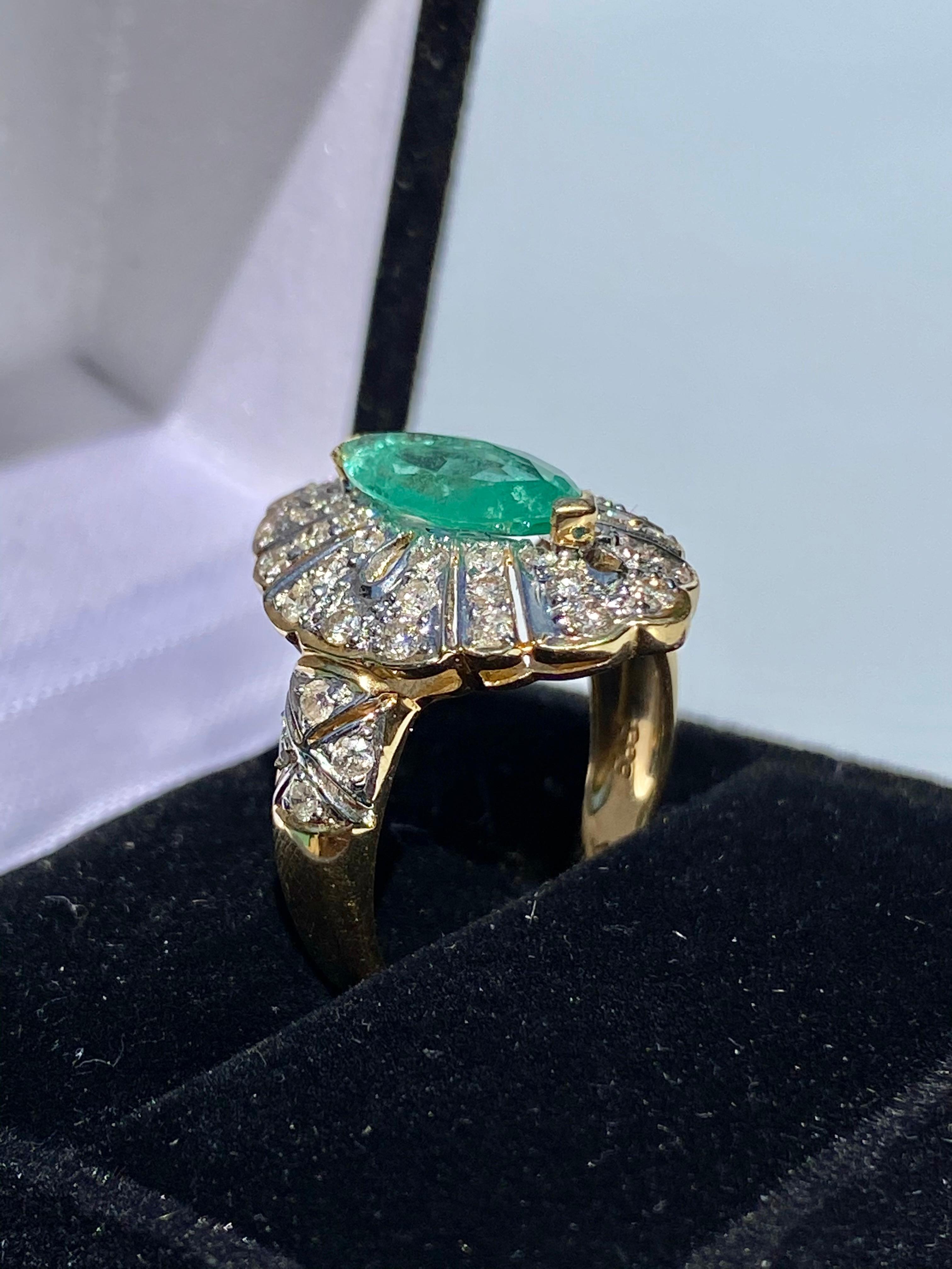 Marquise Cut 1.50 Carat Marquis Cut Colombian Emerald, Diamond and 14 Karat Yellow Gold Ring For Sale