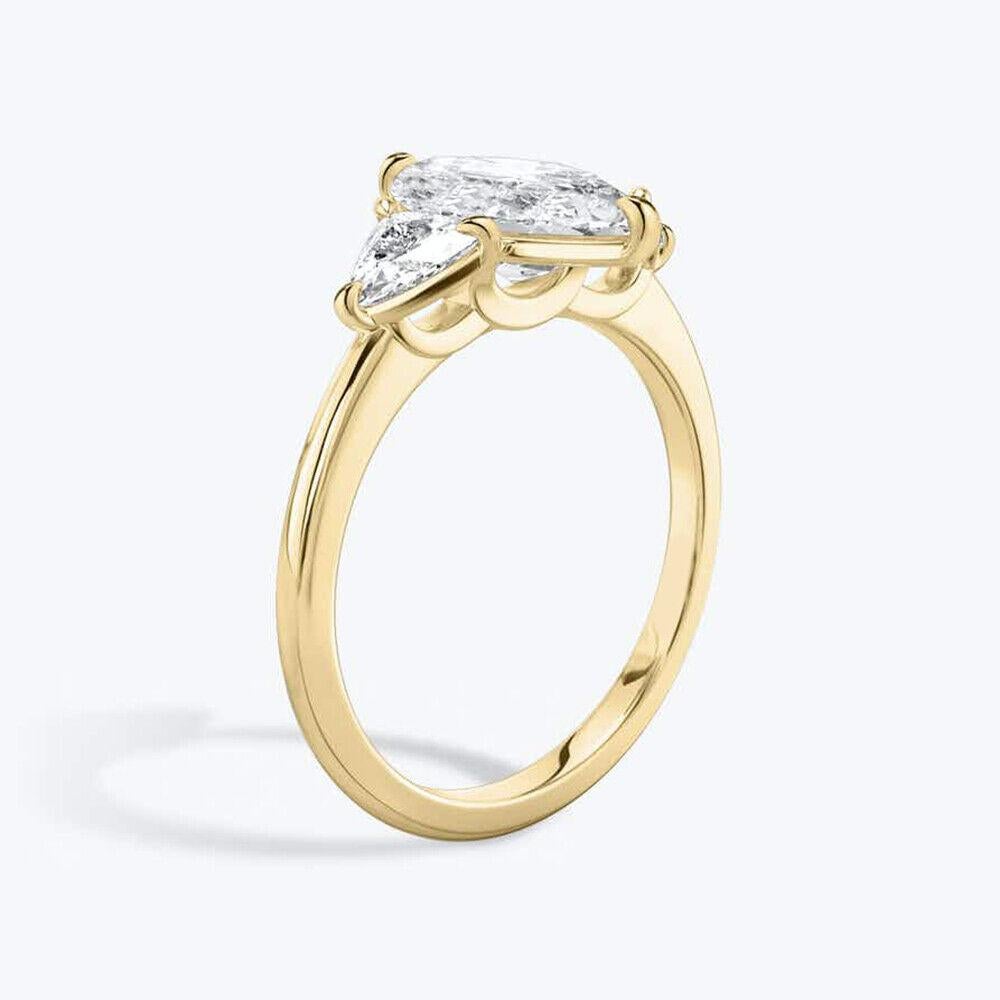 Moderne Bague de fiançailles en or 14 carats avec diamant taille marquise de 1,50 carat en vente
