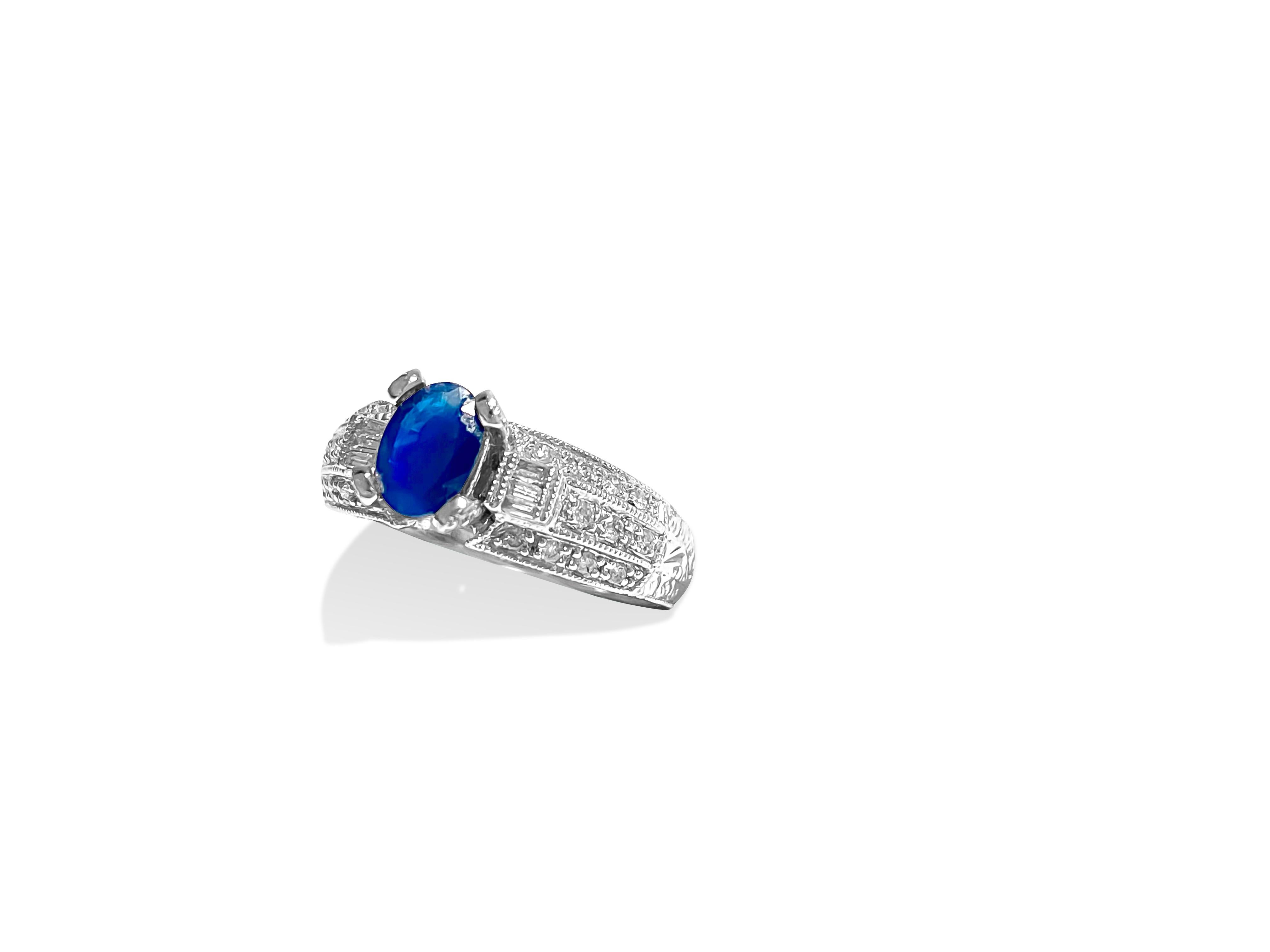 Metal: 18k white gold

Blue Sapphire: 1.50 carat center. Oval shape set in prongs. 100% natural earth mined. Cornblue color and deep saturation 

Diamonds: 1.00 carats total. VS-SI clarity and G-H color. 
Round brilliant and baguette cut diamonds.
