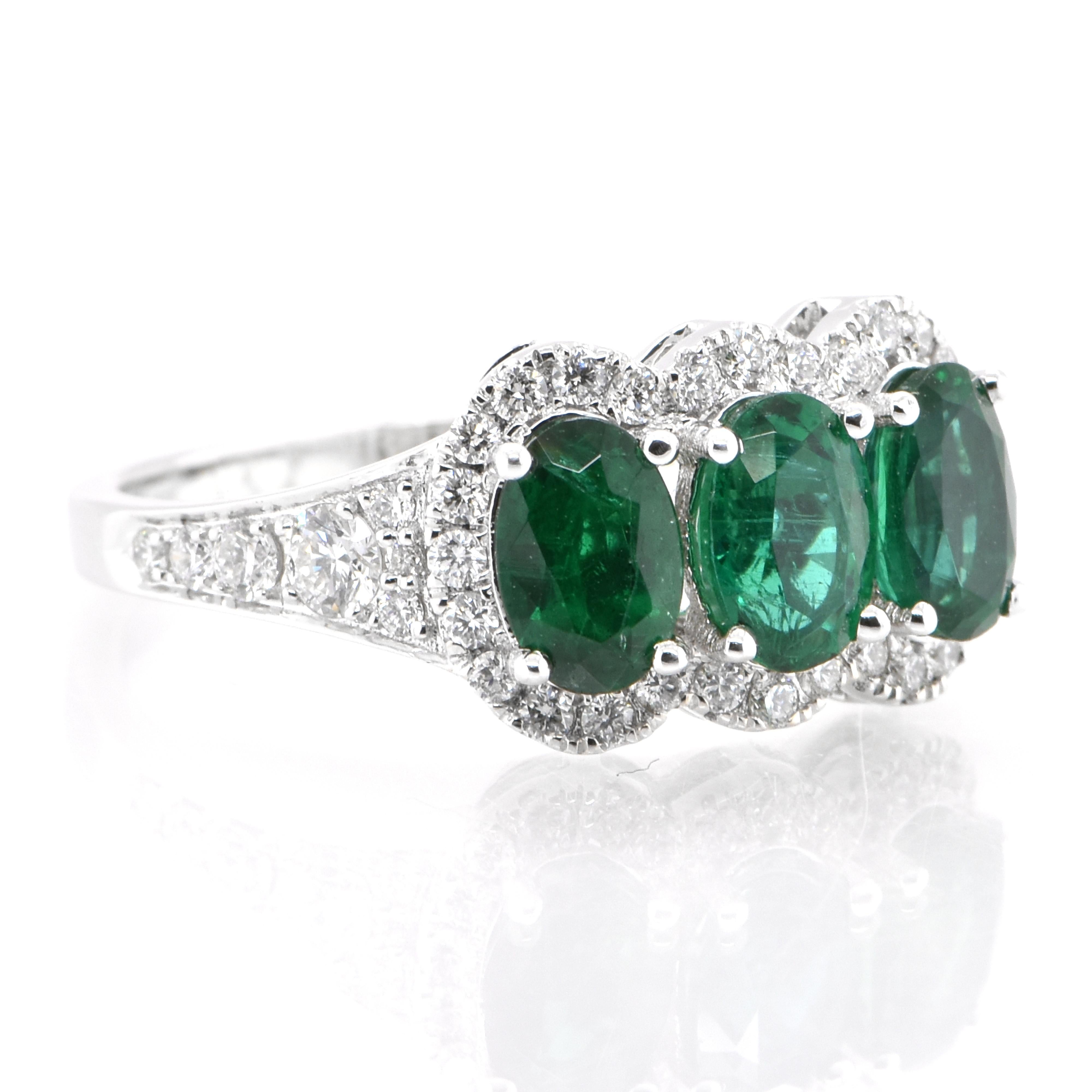 Modern 1.50 Carat Natural Emerald and Diamond Cluster Ring Set in 18K White Gold For Sale