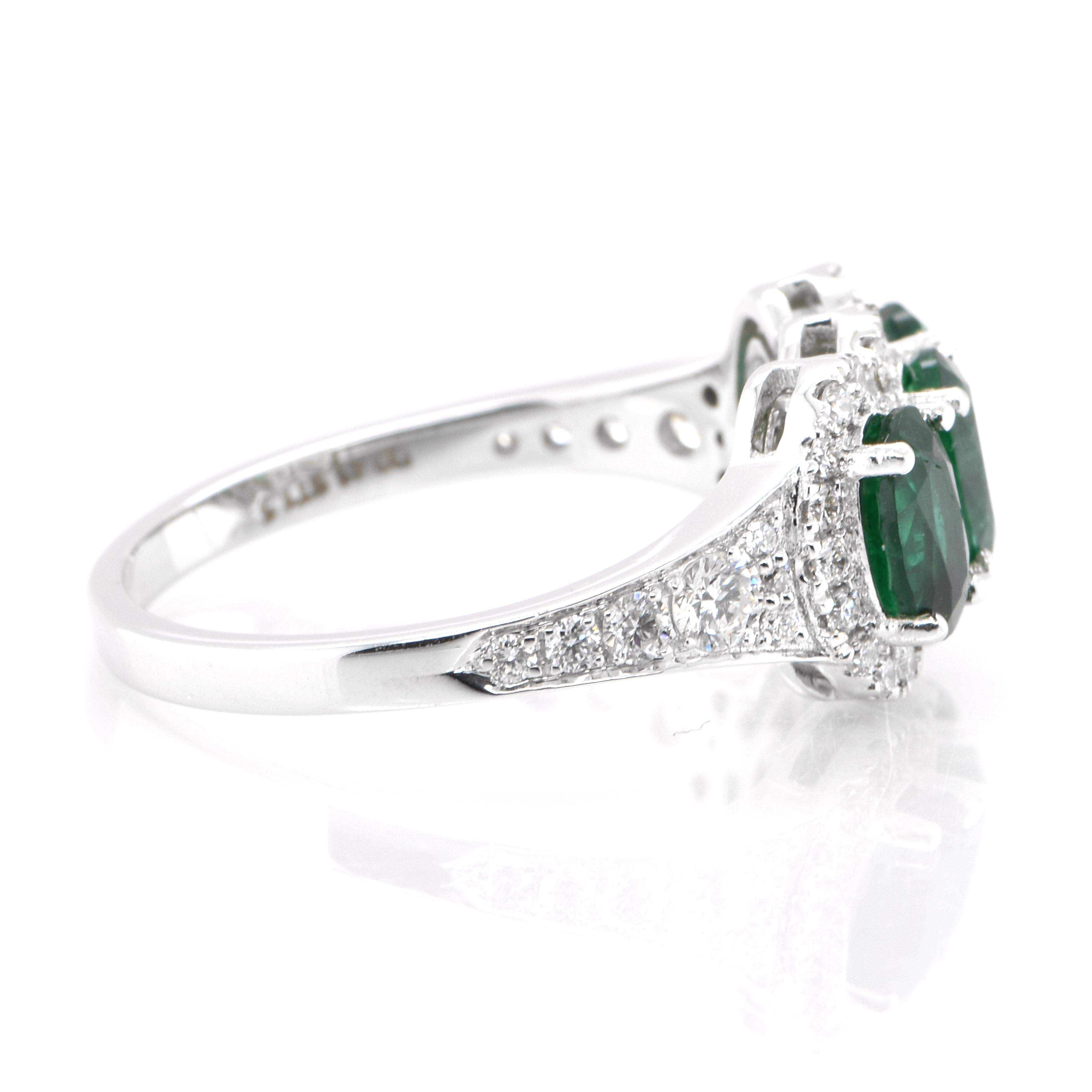 1.50 Carat Natural Emerald and Diamond Cluster Ring Set in 18K White Gold In New Condition For Sale In Tokyo, JP
