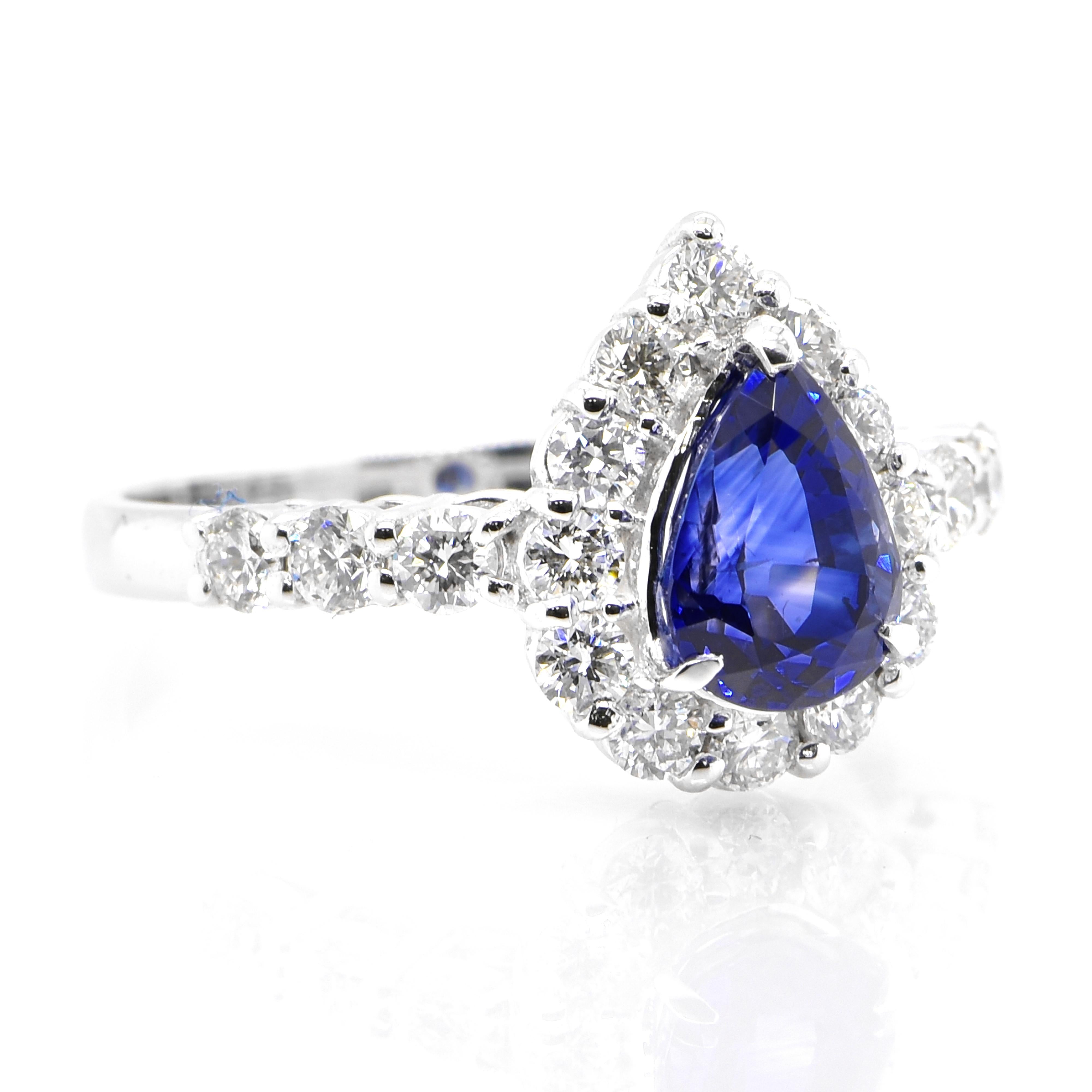 Modern 1.50 Carat Natural Royal Blue Color Sapphire and Diamond Ring Made in Platinum For Sale