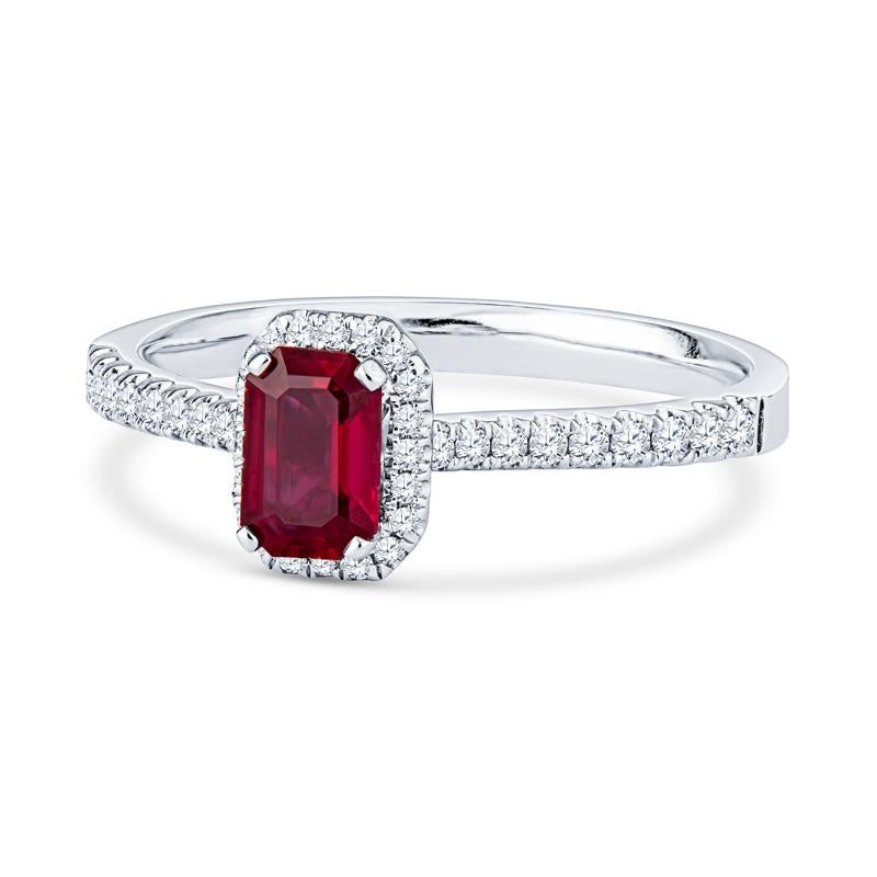 This ring features a 1.50 carat emerald cut, no heat, Mozambique natural ruby accented with 0.20 carat total weight in round brilliant cut diamonds set in an 18 karat white gold cathedral style ring. This ring is a size 6.5 but can be resized upon