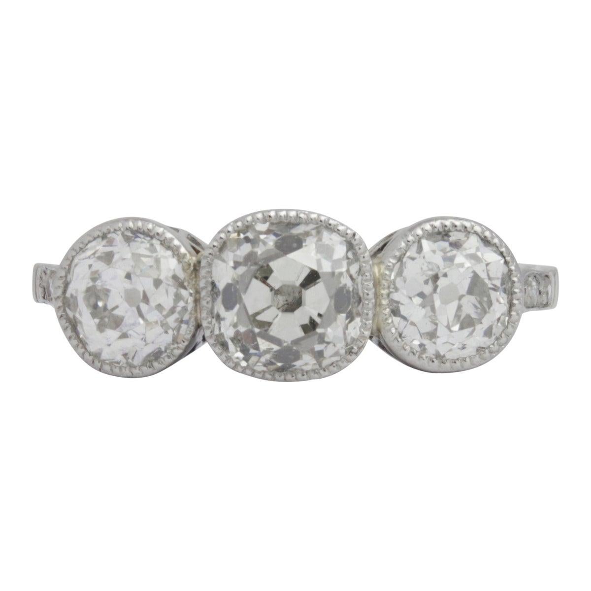 1.50 Carat Old Cut Diamond Trilogy Platinum Ring For Sale