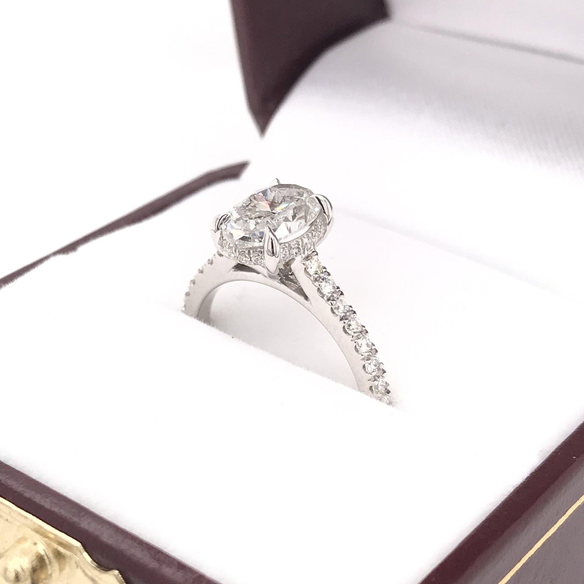 Modern 1.50 Carat Oval Diamond Hidden Halo Engagement Ring
