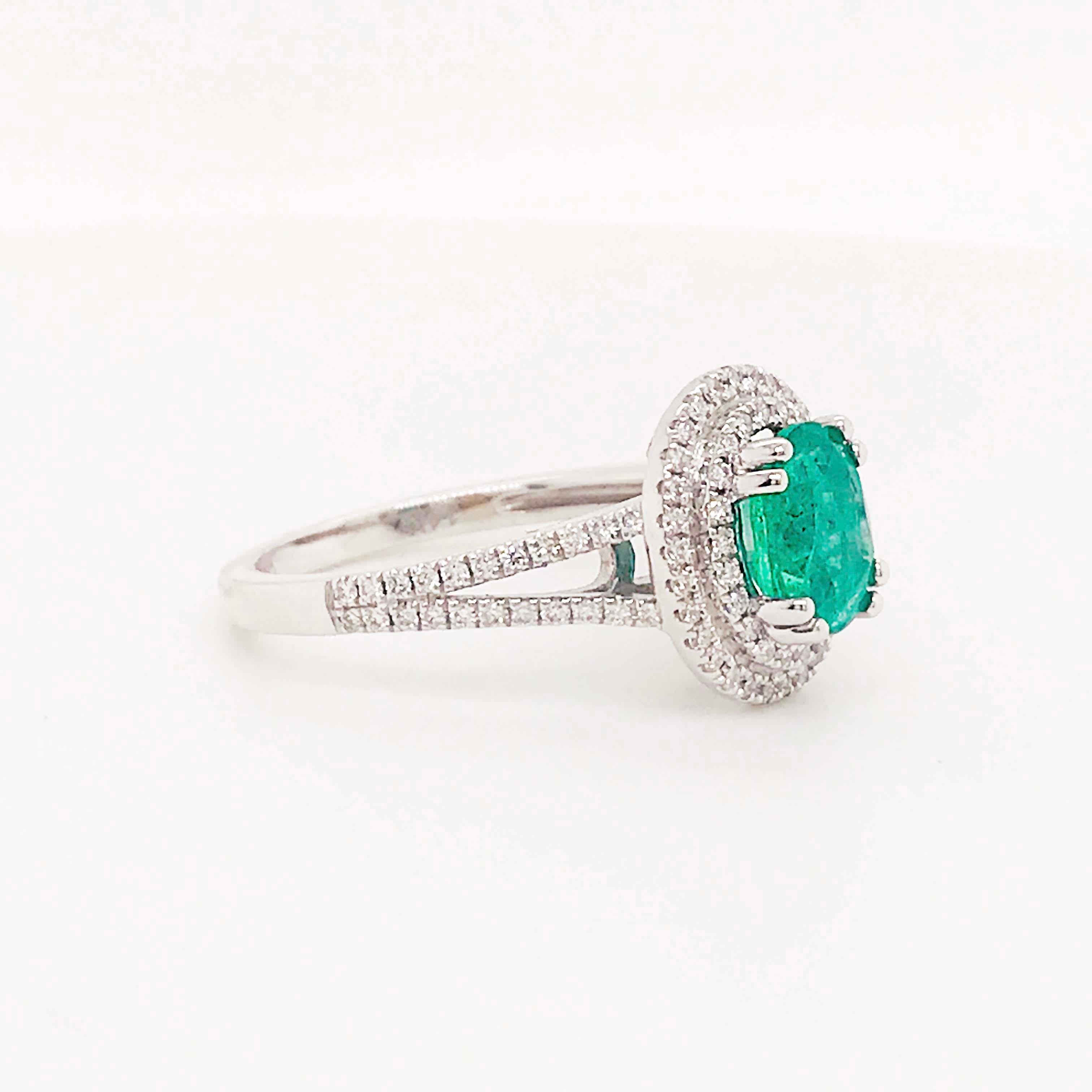 Women's 1.50 Carat Oval Emerald and Diamond Halo Engagement Ring White Gold Diamond Band For Sale