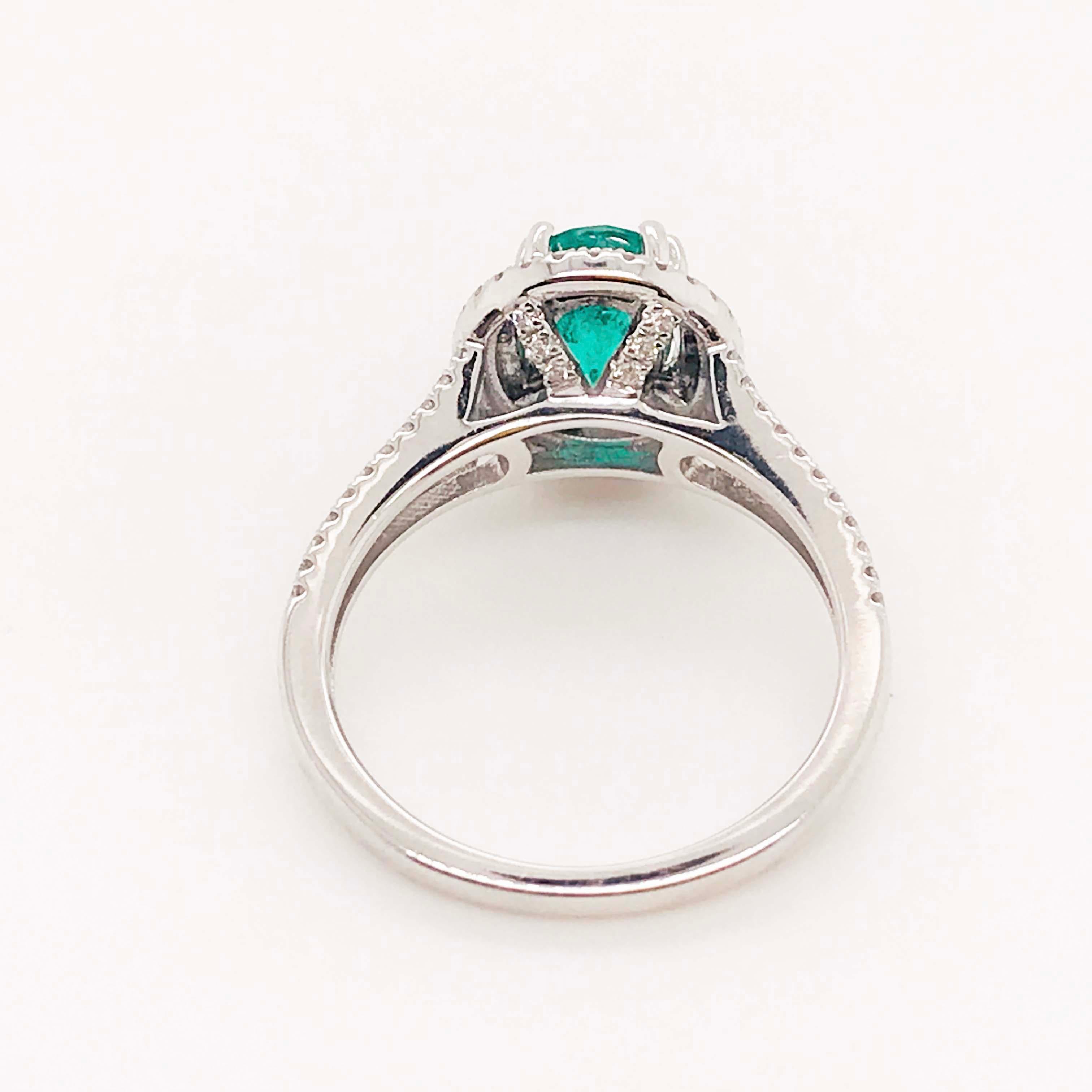 1.50 Carat Oval Emerald and Diamond Halo Engagement Ring White Gold Diamond Band For Sale 2