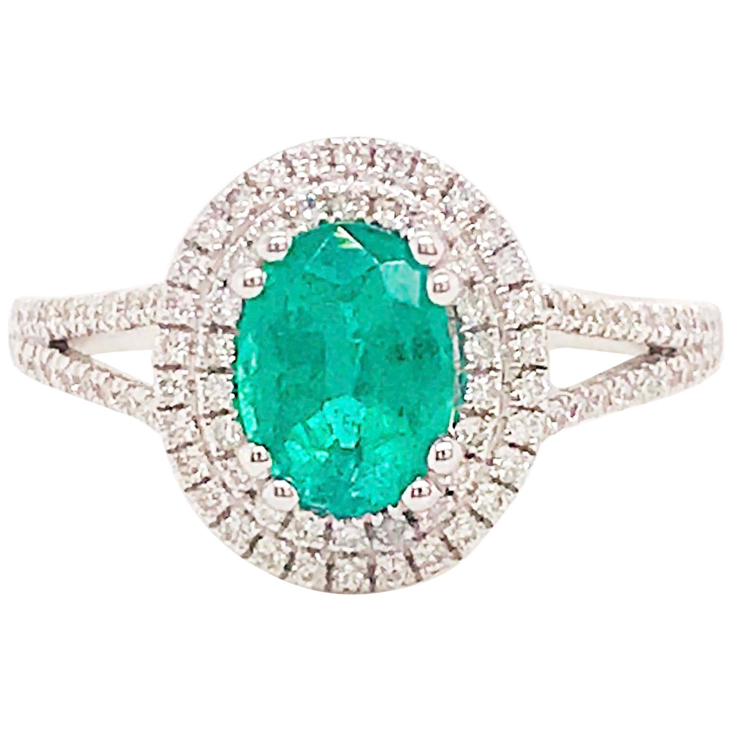 1.50 Carat Oval Emerald and Diamond Halo Engagement Ring White Gold Diamond Band For Sale
